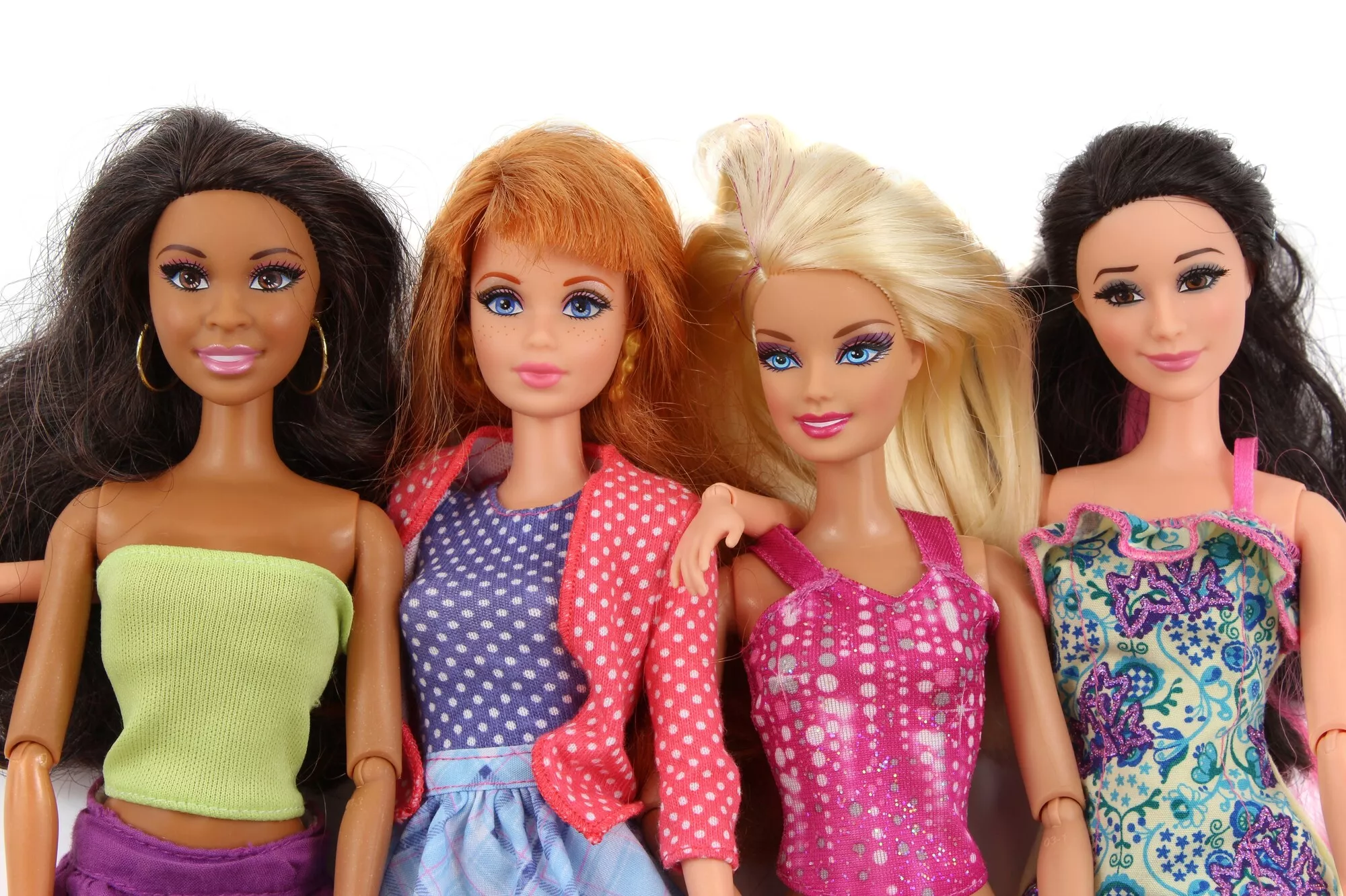 Neljä Barbie-nukkea