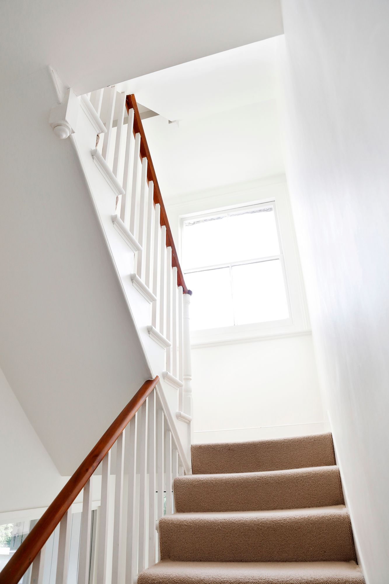 Lapsiperheen kolmen kerroksen kodissa portaikot ovat kovassa käytössä.