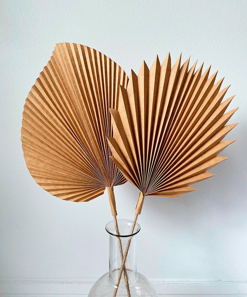 Paperista taiteltu palmunlehti on hauska lisä sisustukseen. Kuva: OM-Arkisto